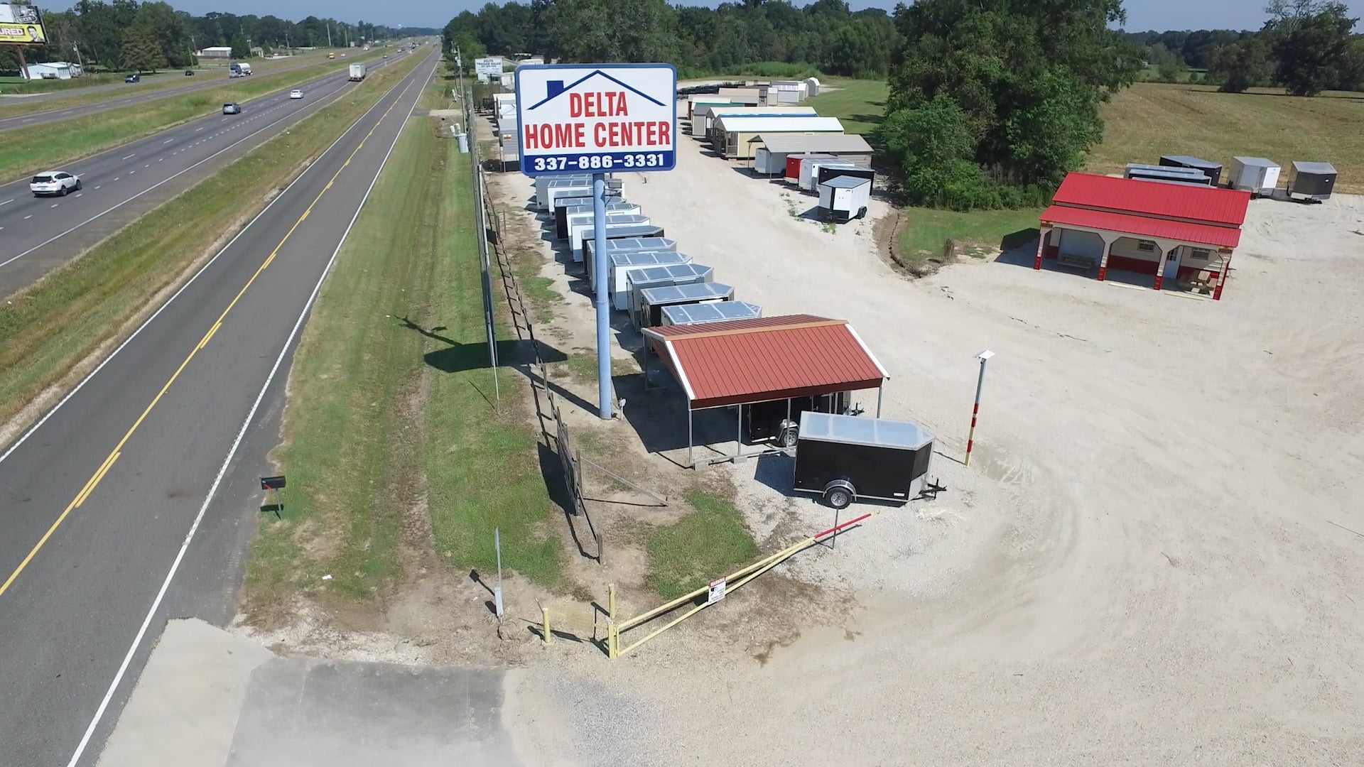 Aerial view of Delta Trailer Sales lot at 4840 NE Evangeline Thruway, Carencro, Louisiana showing rows of trailers in stock